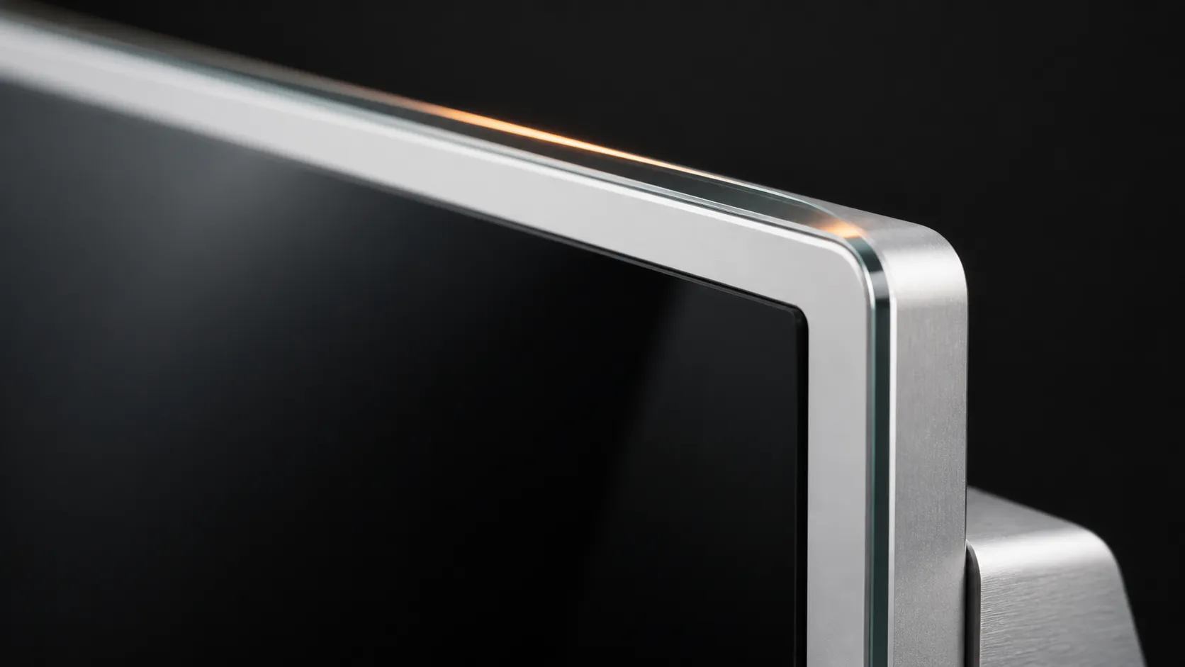 Close view of a Capital Infoart glass-fascia display edge with an orange highlight