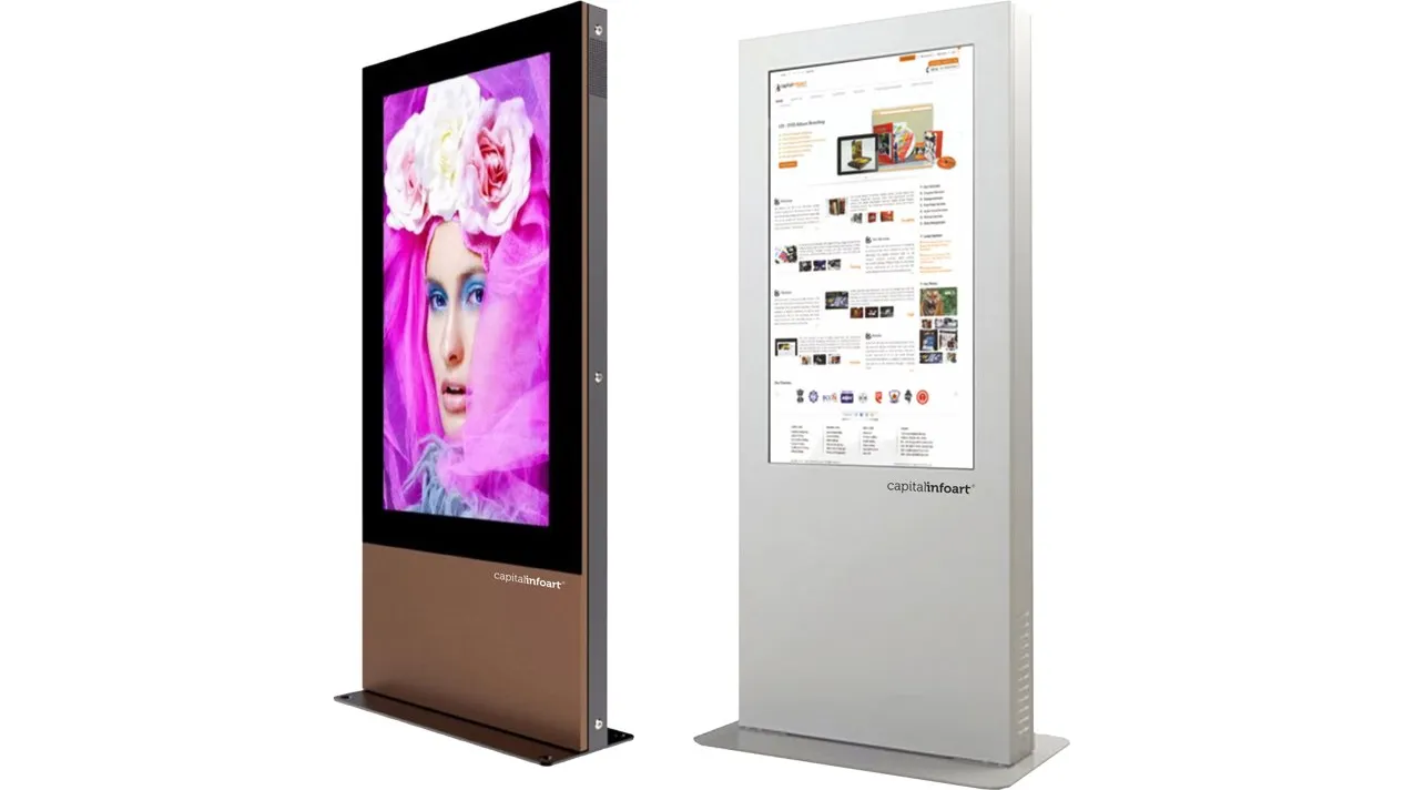 Two Capital Infoart outdoor floor-standing digital signage totems in black and silver weather-sealed enclosures
