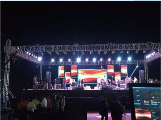 Rental LED screens on a truss stage at a night event