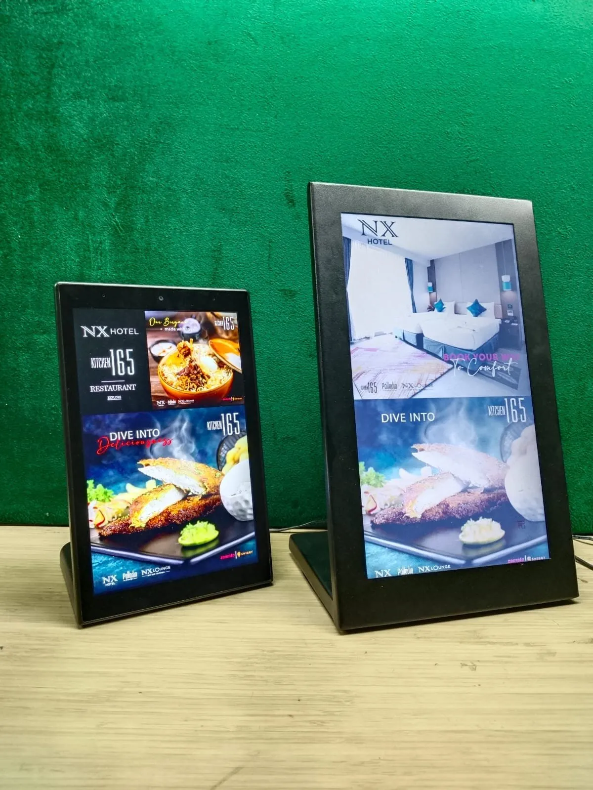 Two metal-framed table top displays showing hotel offers